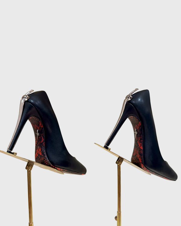 Eadgar Gold Sword Heel Pumps In Black