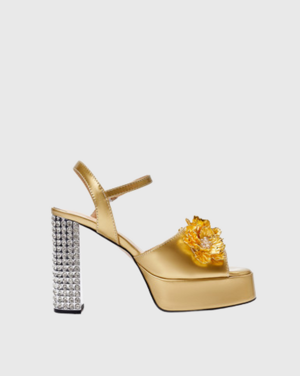 Cai Rhinestone Flower Strap Platform Sandals In Gold